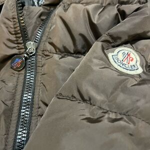 Moncler jacket with real down feathers, recently dry-cleaned. Looks like new!